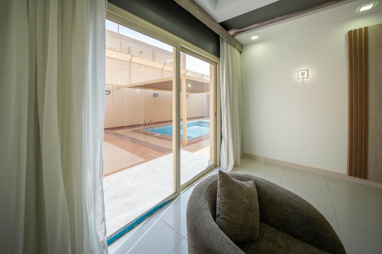 Mirada Gold Jizan - Resort & Private Pools Εξωτερικό φωτογραφία A sliding window